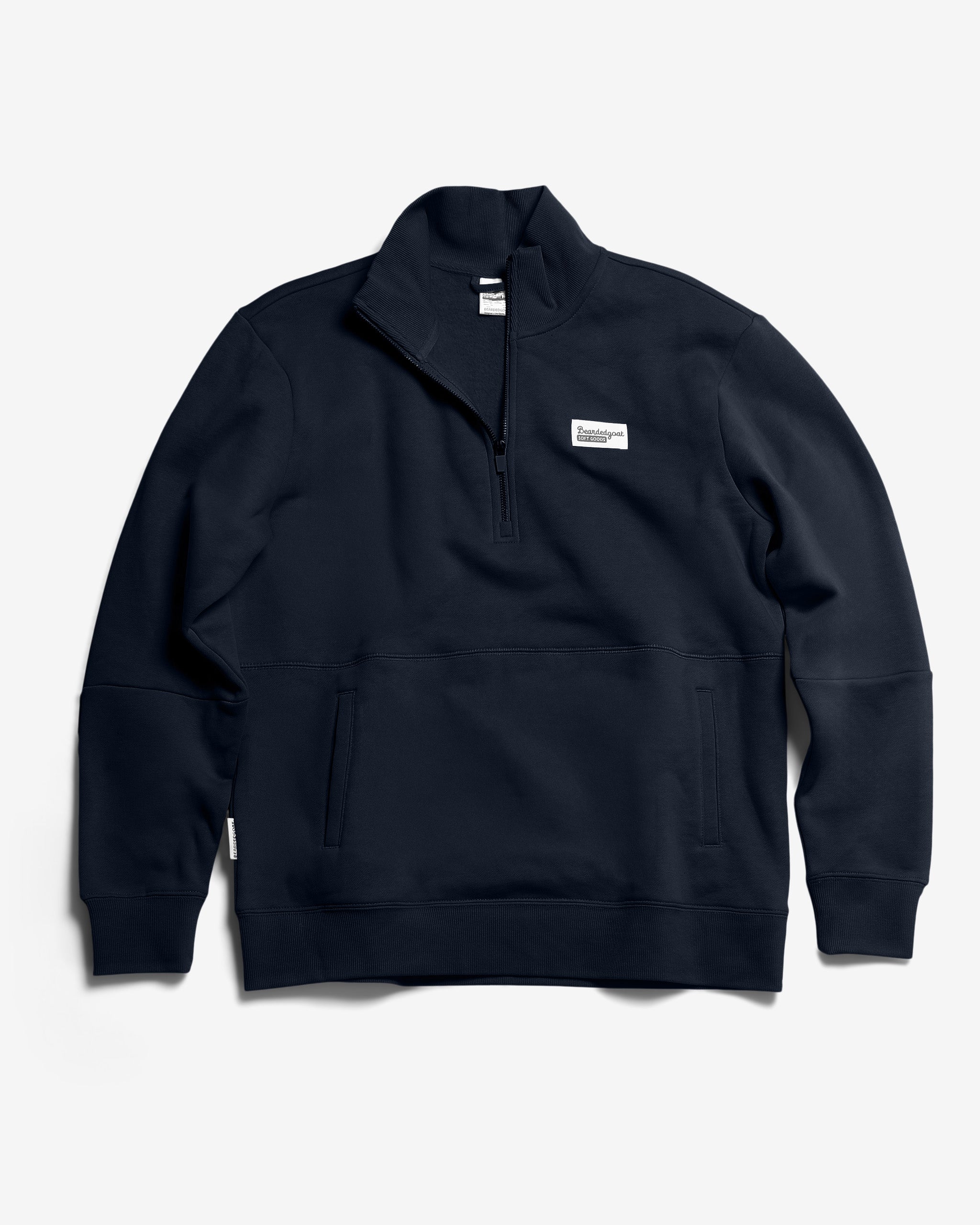 The BEARDEDGOAT NEW — VOID™ Half Zip in Dark Navy is a premium cotton fleece sweatshirt with a stand-up collar, front kangaroo pocket, and a small rectangular white label on the left chest, laid flat on a white background.