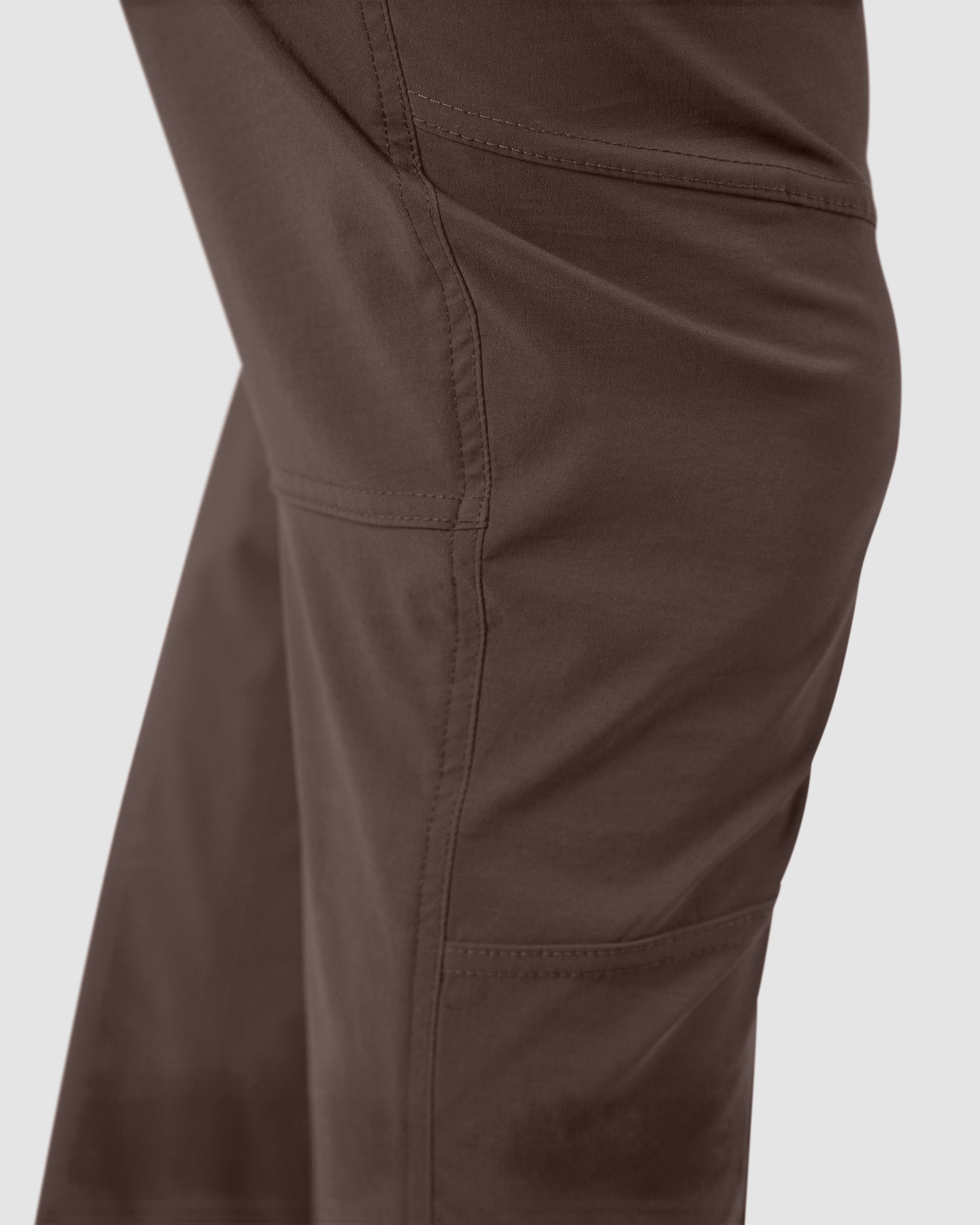 Close-up of the BEARDEDGOAT NEW—ROVER™ Pant, highlighting side seam and pocket details with visible stitching and textured, performance stretch nylon fabric designed for all four seasons.