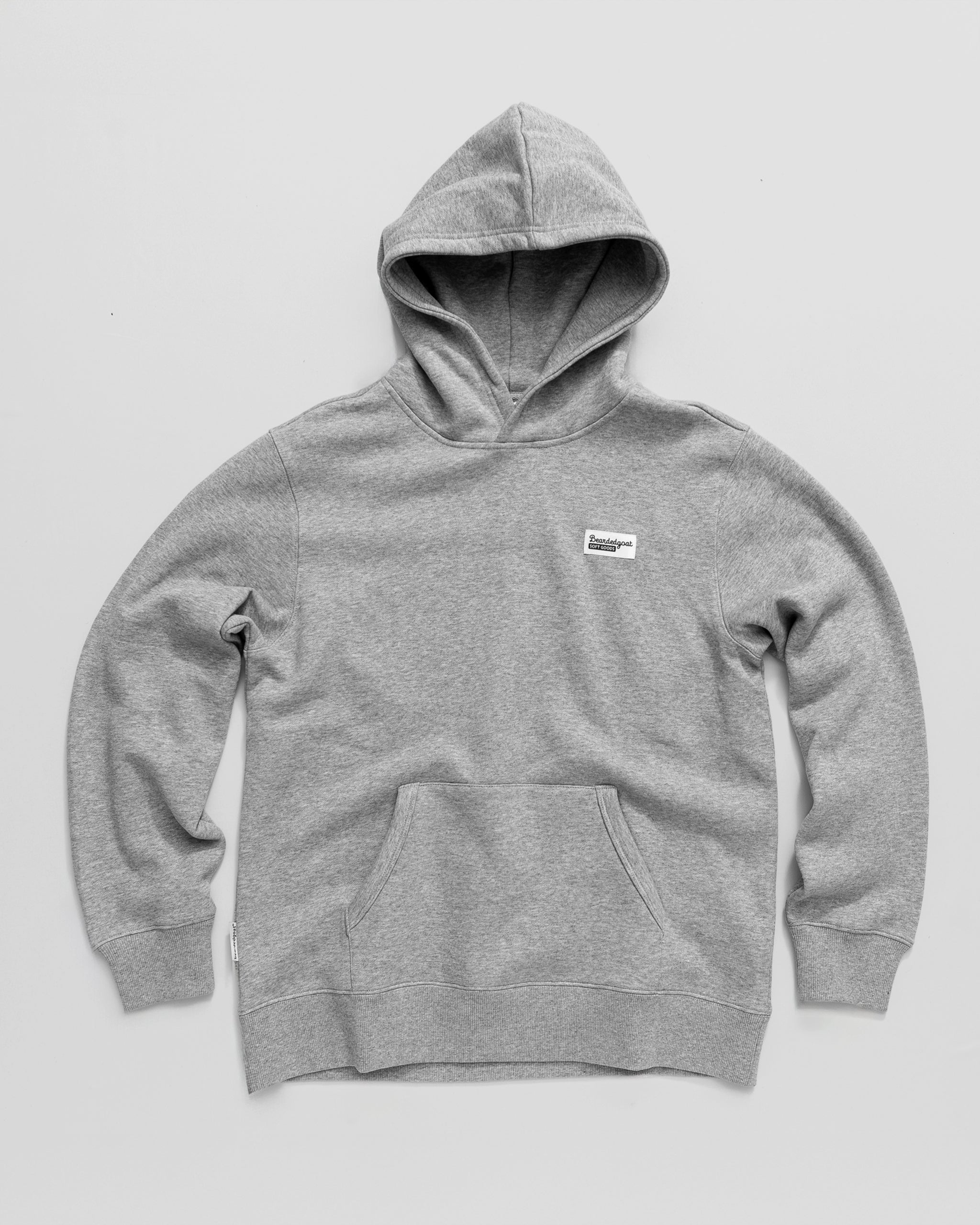 The VOID™ Hoodie by beardedgoat is a best-selling men’s heavyweight cotton fleece hoodie with a front pocket and a small white rectangular chest tag, shown flat on a light gray background.