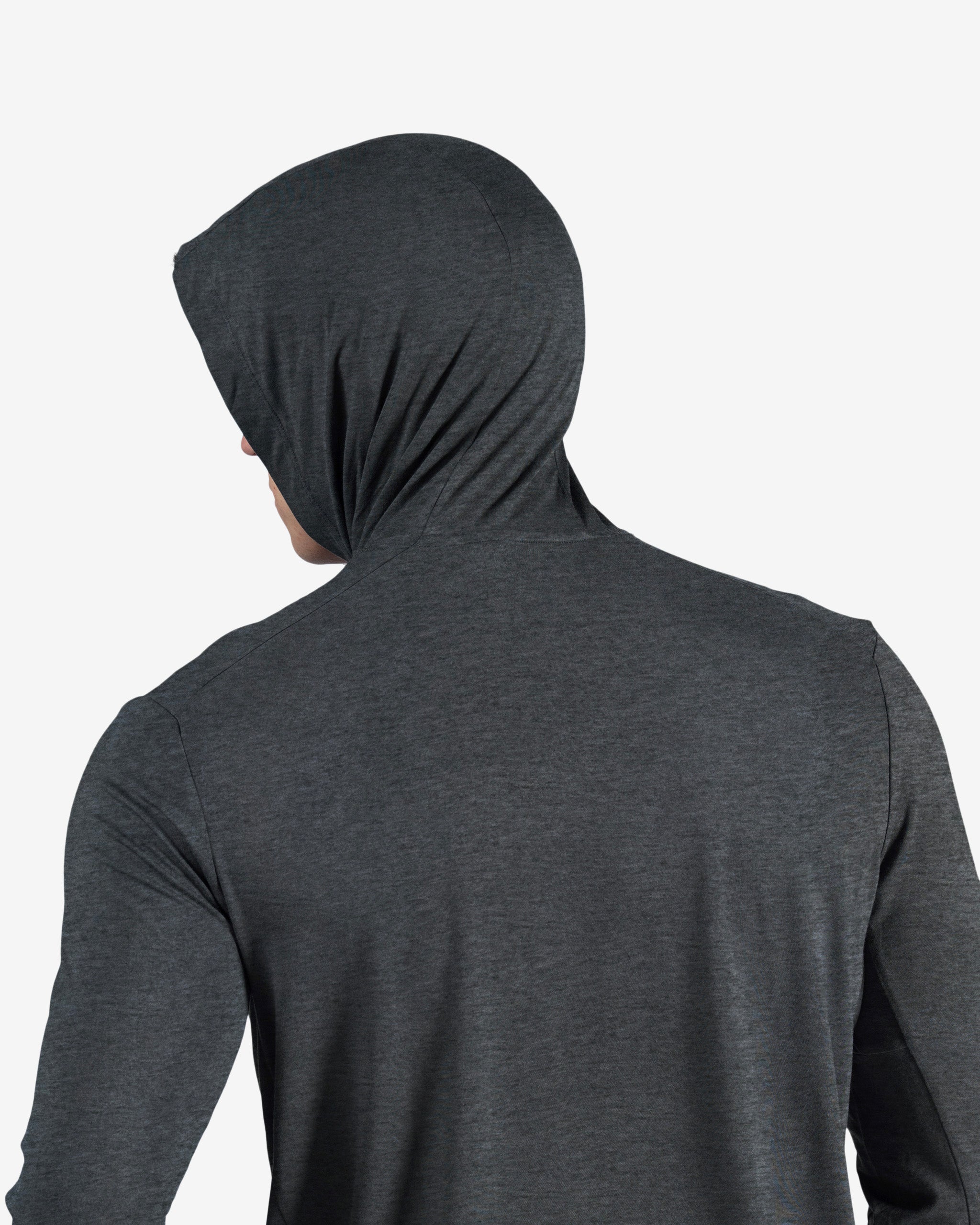 A person is shown from the back, hood up and head turned slightly, wearing the BEARDEDGOAT Men’s EverZen™ Hoodie in dark gray—crafted from sustainable materials—against a plain white background.
