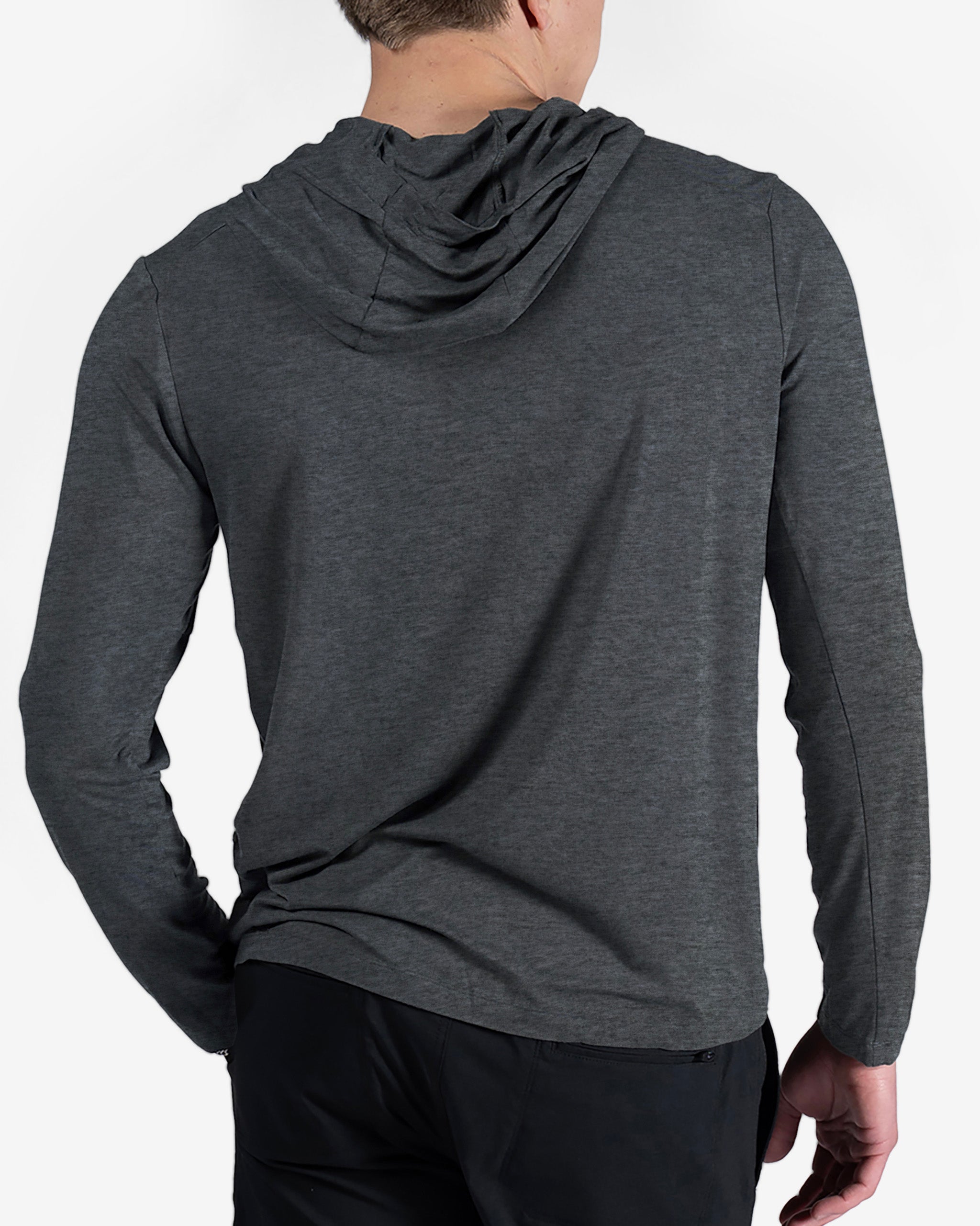 A person is shown from the back, wearing the BEARDEDGOAT Men’s EverZen™ Hoodie in dark gray with black pants. The hoodie has a loose fit and the hood down, set against a plain white background, ideal for those seeking sustainable style.