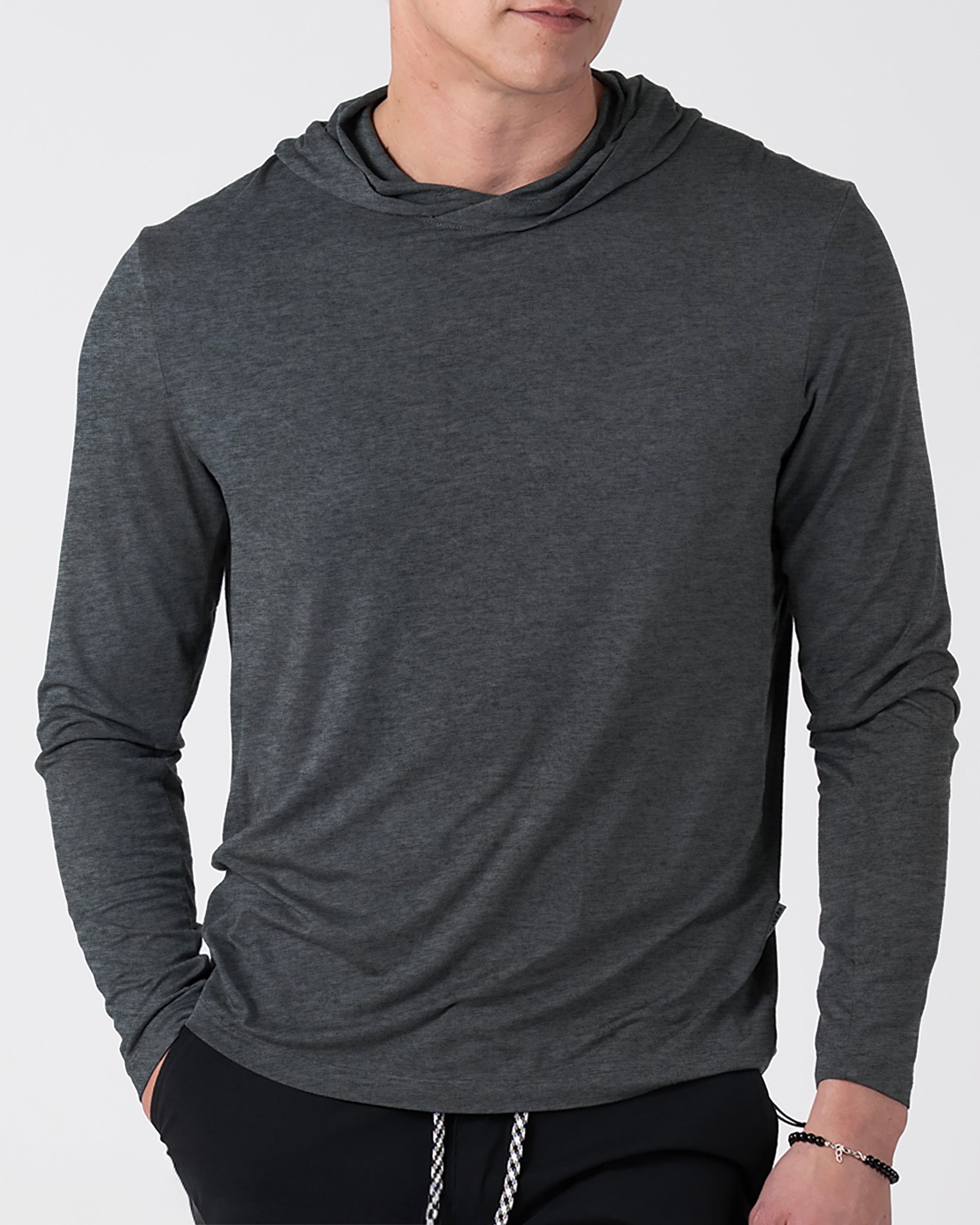 A man wearing the BEARDEDGOAT Men’s EverZen™ Hoodie in grey, highlighting stylish and sustainable fashion.