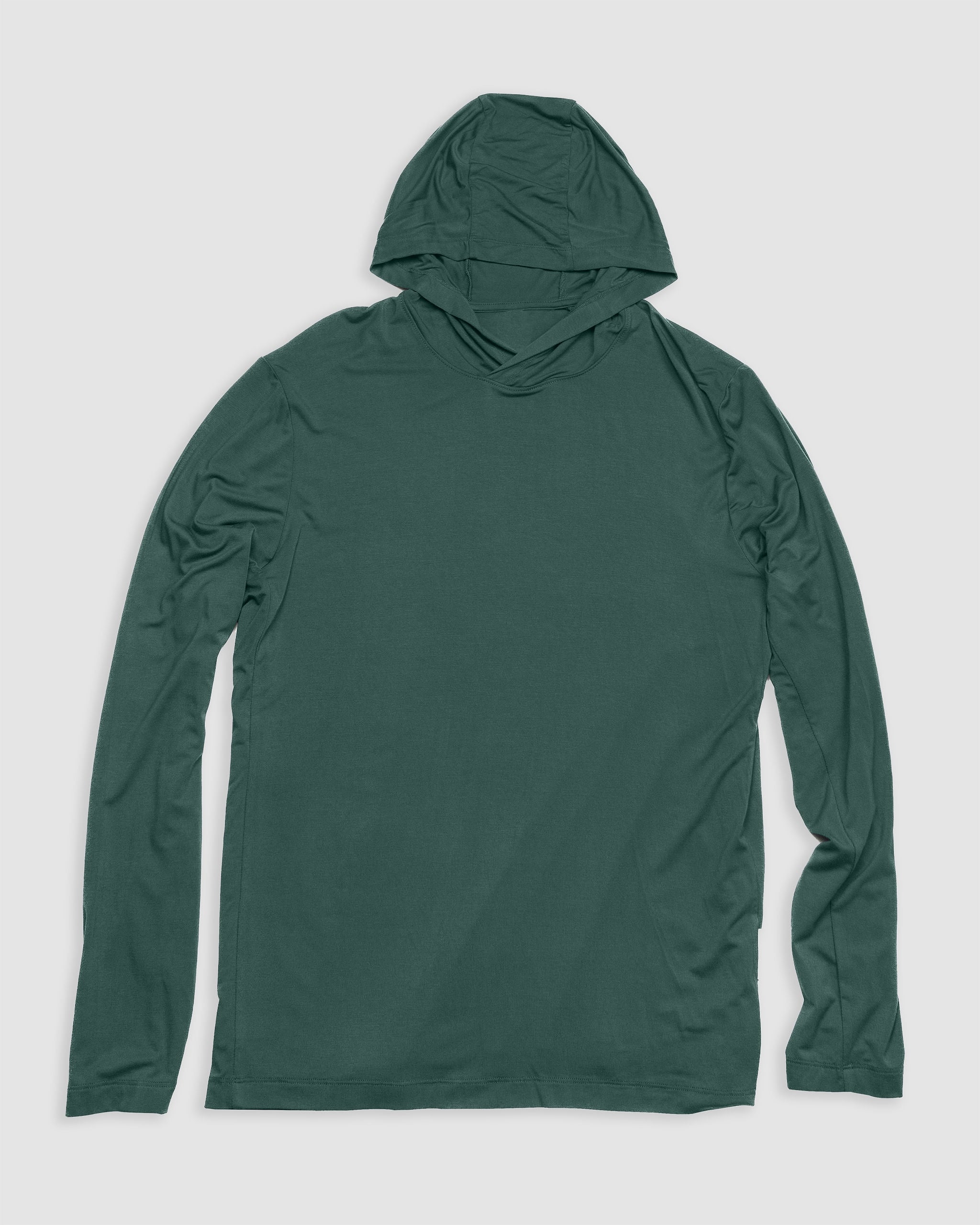 The Men’s EverZen™ Hoodie by BEARDEDGOAT in Cypress is laid flat on a light gray background. This bamboo hoodie features a relaxed fit and minimalist design, providing comfort and sustainable style.