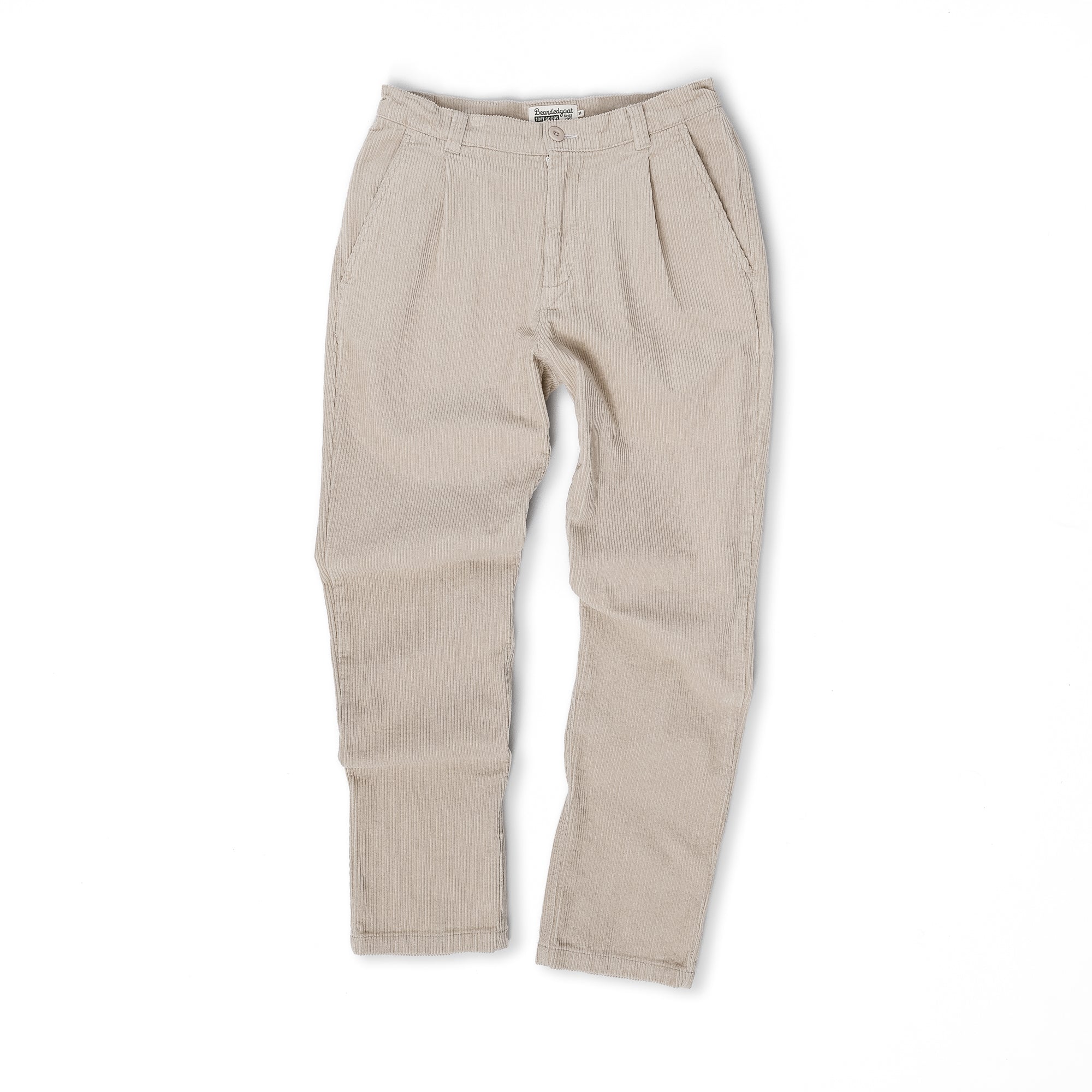 The beardedgoat Mens Moor Corduroy Pant is shown laid flat on a white background, featuring a loose fit, front pockets, and a button closure.