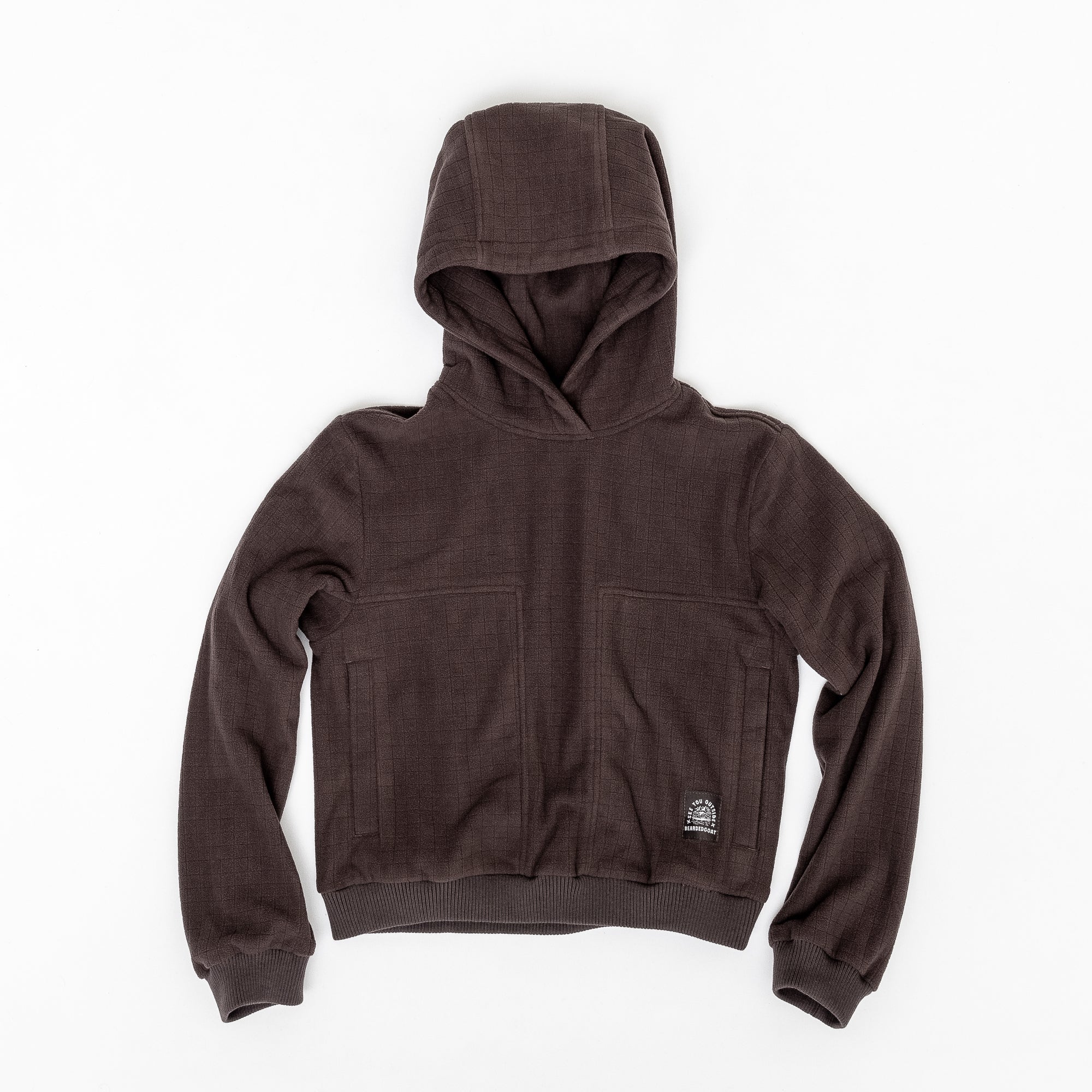 The beardedgoat Womens Sierra Hoodie in brown features thermal fleece, two front pockets, and a patch near the waistband, shown flat on a white background.