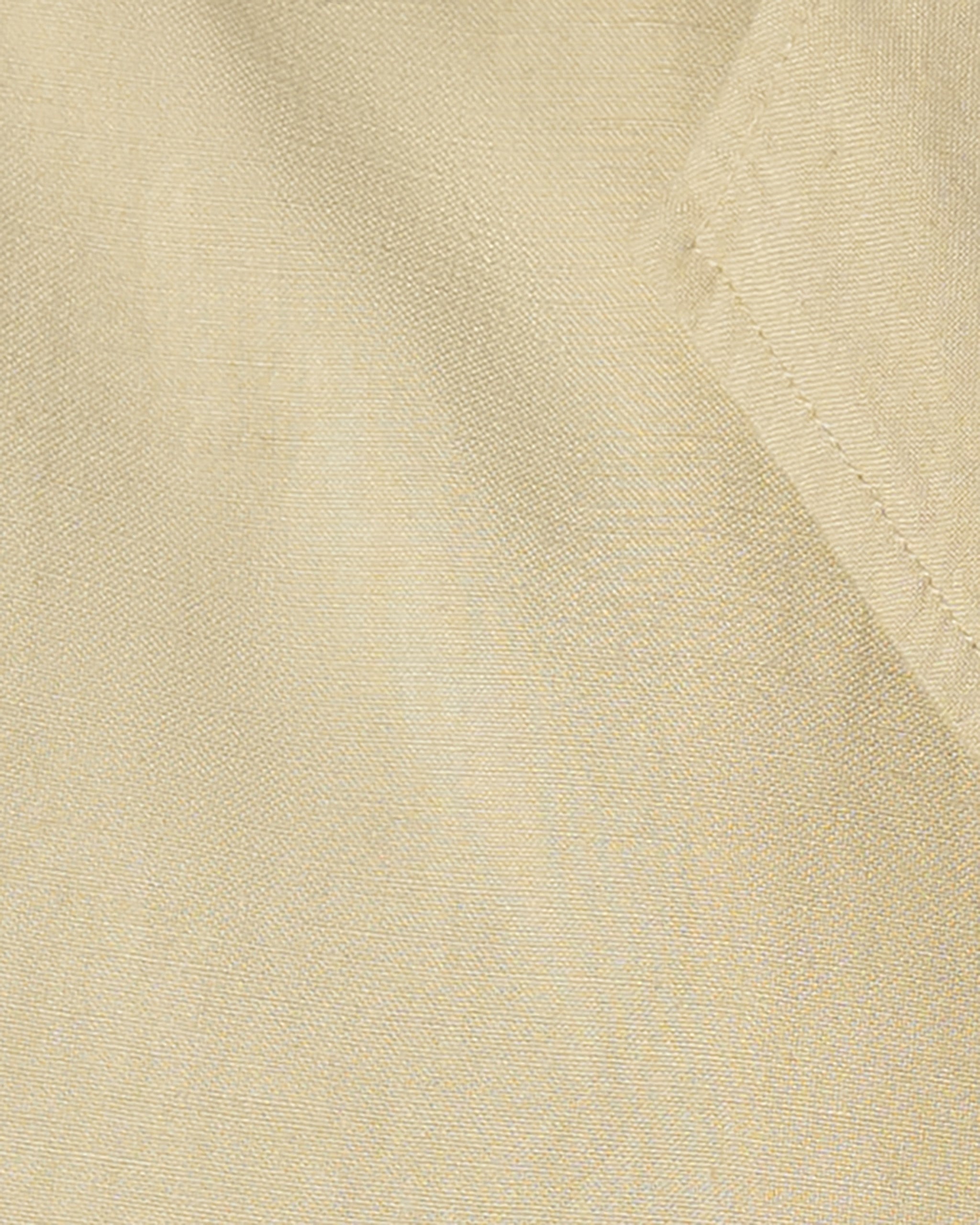 Close-up of the Womens Breeze Shirt by BEARDEDGOAT shows light beige, lightweight linen fabric with visible seam and folded corner, highlighting its subtle texture and fine stitching—a timeless warm-weather essential.