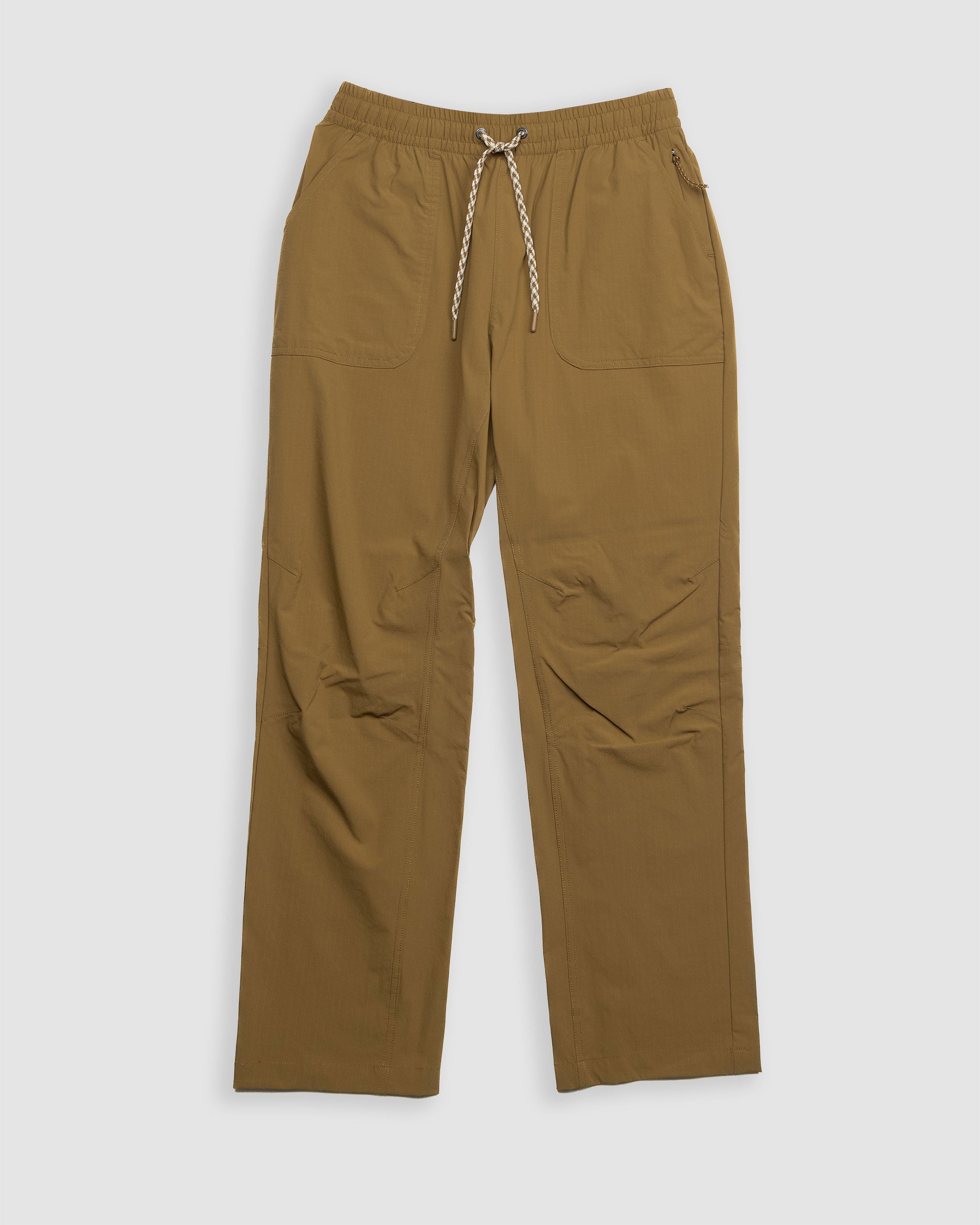 The BEARDEDGOAT NEW — Summit™ Pant is a women's performance straight-leg pant with an elastic waistband, white-and-brown drawstring, and large front pockets, shown in brown and laid flat on a white background.