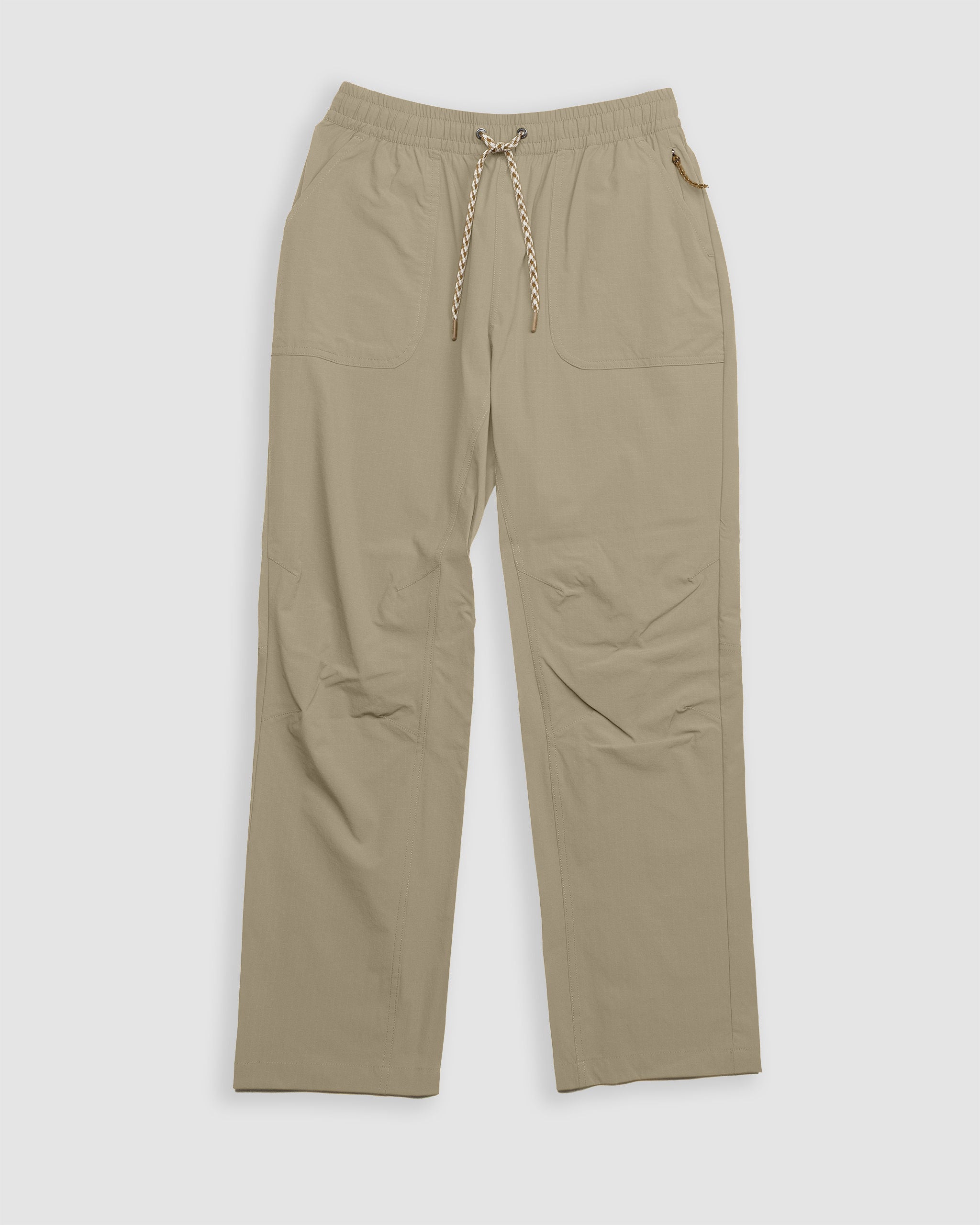 The BEARDEDGOAT NEW — Summit™ Pant in Terra Sienna for women features a drawstring waist, two front pockets, straight-leg fit, and visible stitching. Shown laid flat on a white background, it blends style with performance.