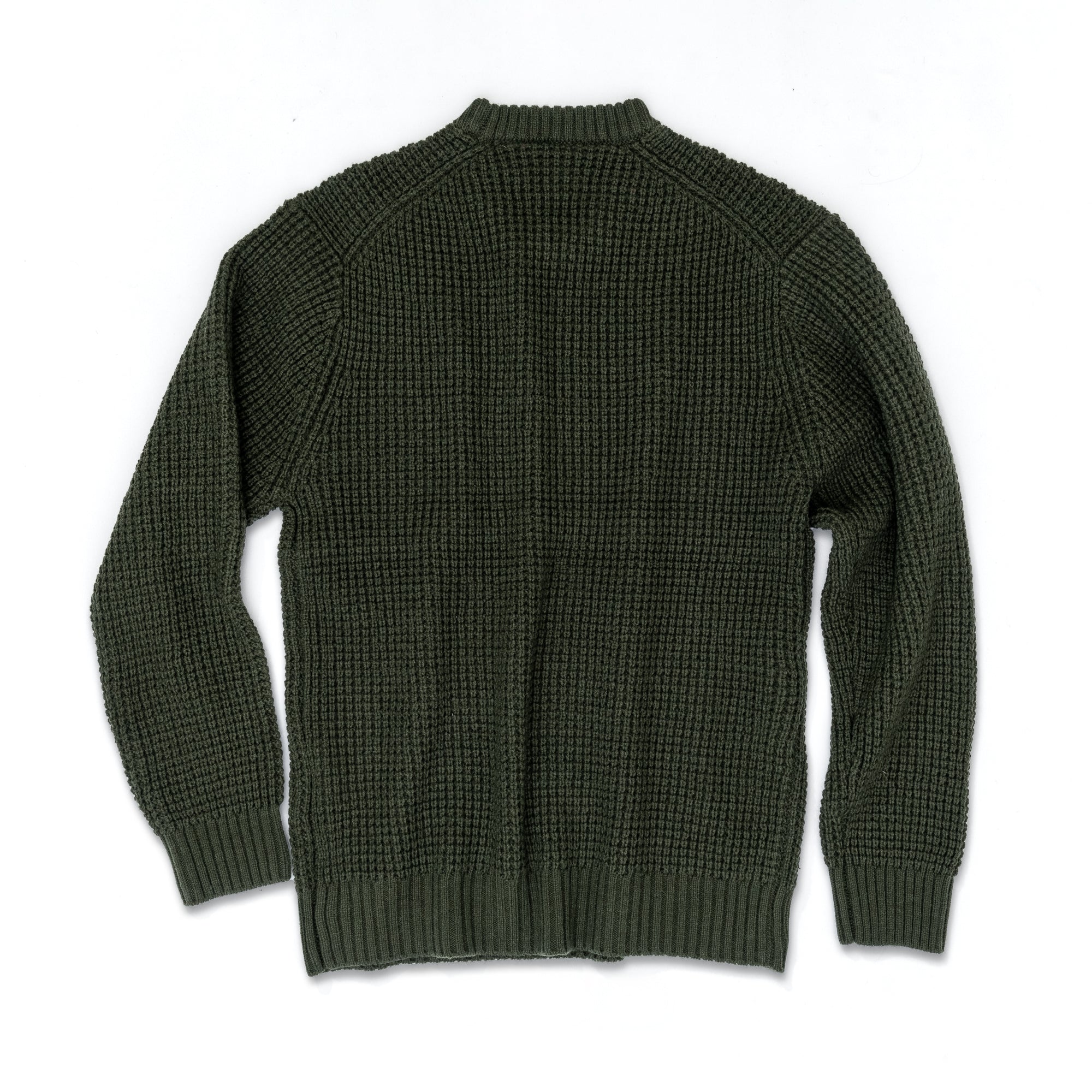 The beardedgoat Mens Odis Boatyard Sweater, shown in dark green with long sleeves, is heavyweight with a waffle-knit texture and has ribbed cuffs, hem, and collar. It is laid flat with the back side facing up.