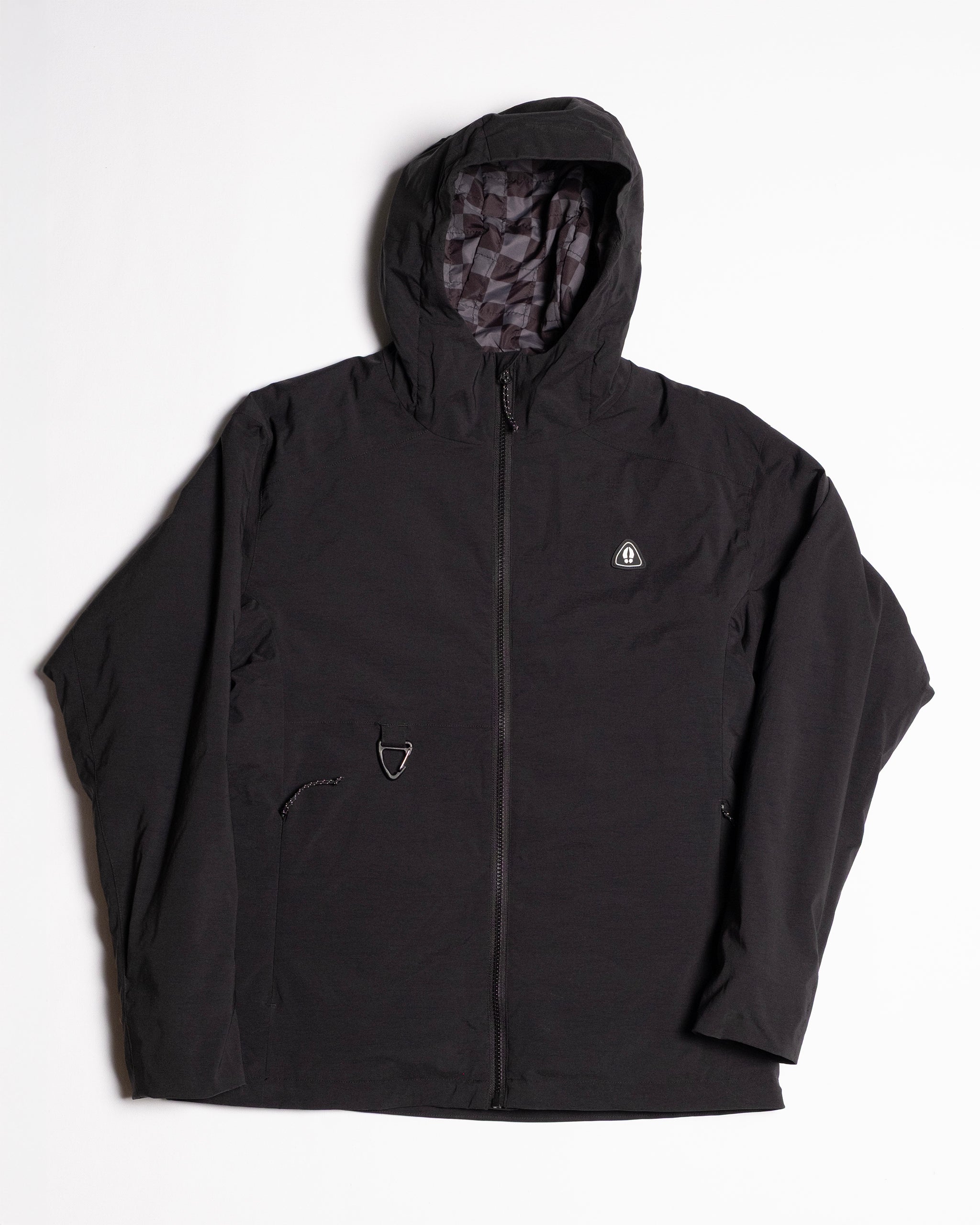 The beardedgoat NEW — OSLO Rover™ Performance All-Season Jacket is a black hooded outerwear piece with a front zipper, geometric-patterned lining, and a small circular chest logo, shown laid flat on a white background.
