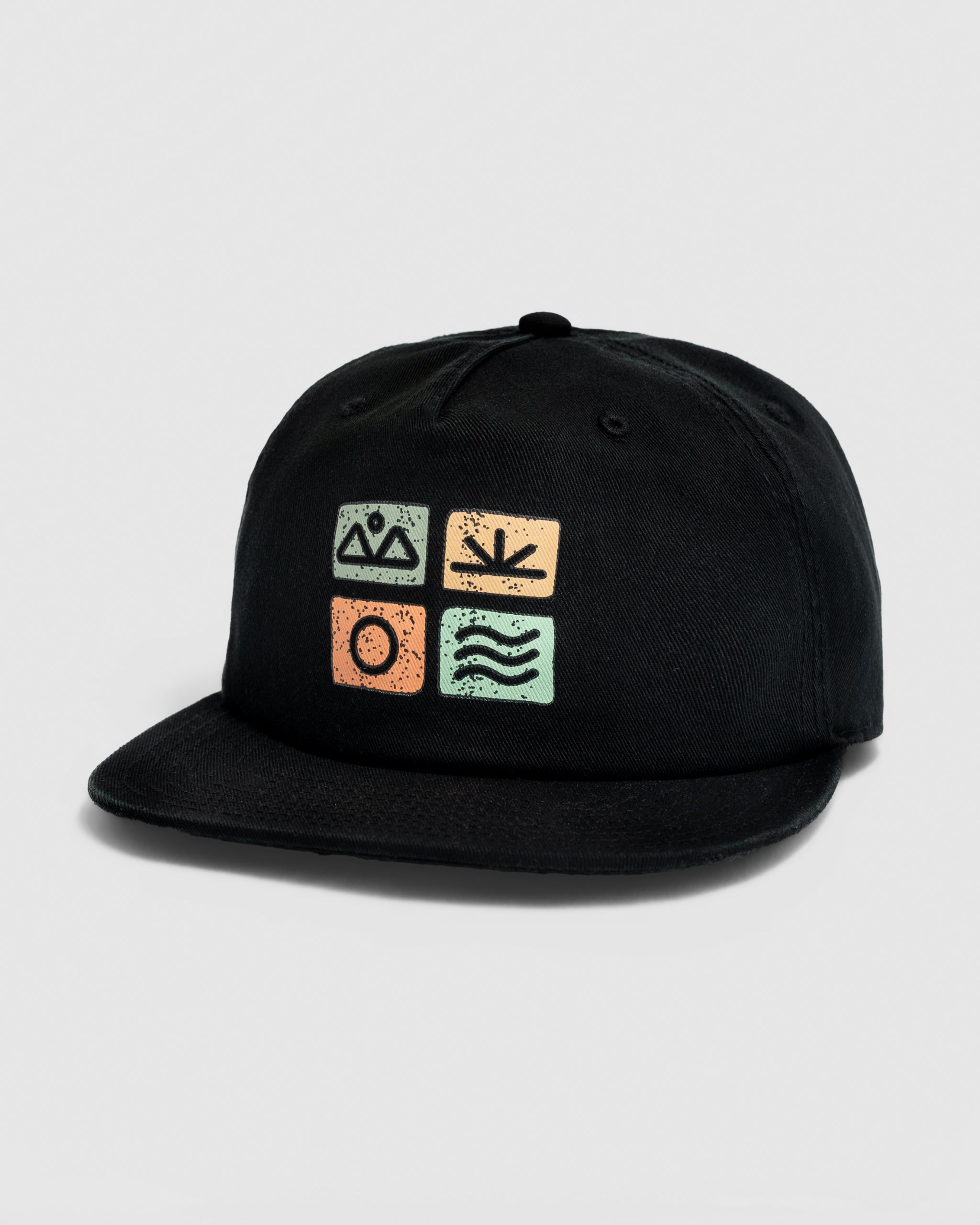 The BEARDEDGOAT Elements Hat - Black is a snapback featuring four square icons—green mountains, an orange sun, a green plant, and blue waves—symbolizing nature elements for outdoor style.