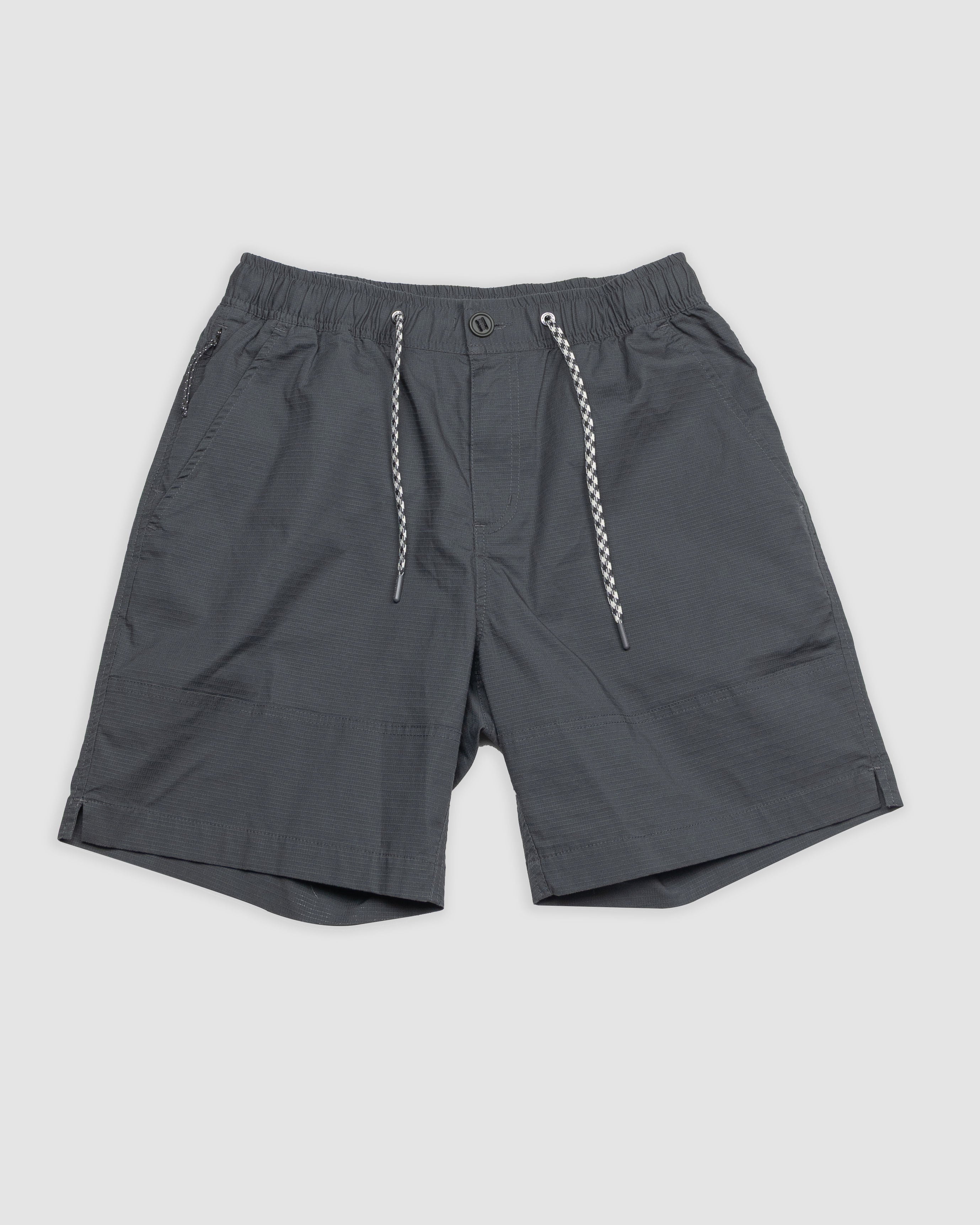 The BEARDEDGOAT Mens Canopy Short, shown flat on a light gray background, features gray stretch cotton ripstop, an elastic waistband, button and zipper closure, white and gray drawstrings, and side pockets.