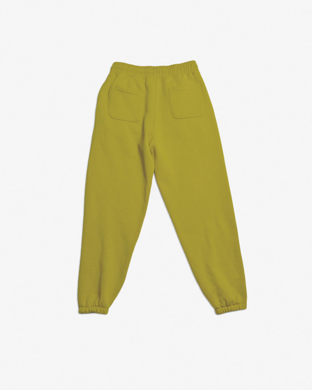 The NEW — Overnight™ Classic Jogger by BEARDEDGOAT features yellow heavyweight cotton fleece, a high-rise elastic waistband, cuffs, and two back pockets. Shown on a plain white background.